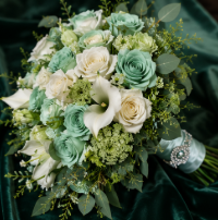 Sage green and white rose bouquet with calla lilies