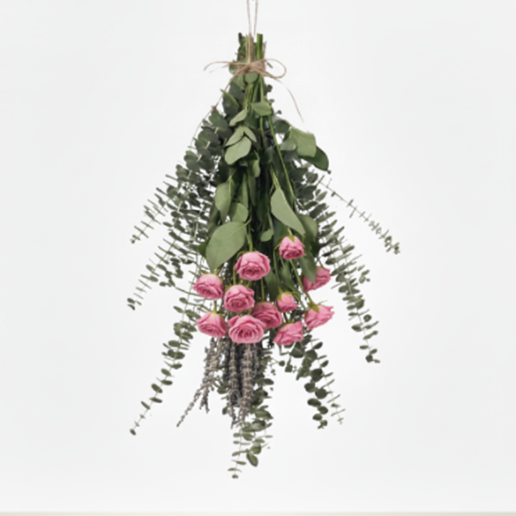 Hanging pink roses and eucalyptus bundle arrangement